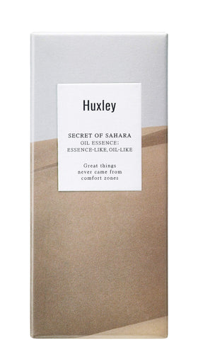 Huxley dropper dispensing clear oil-essence texture, demonstrates quick absorption