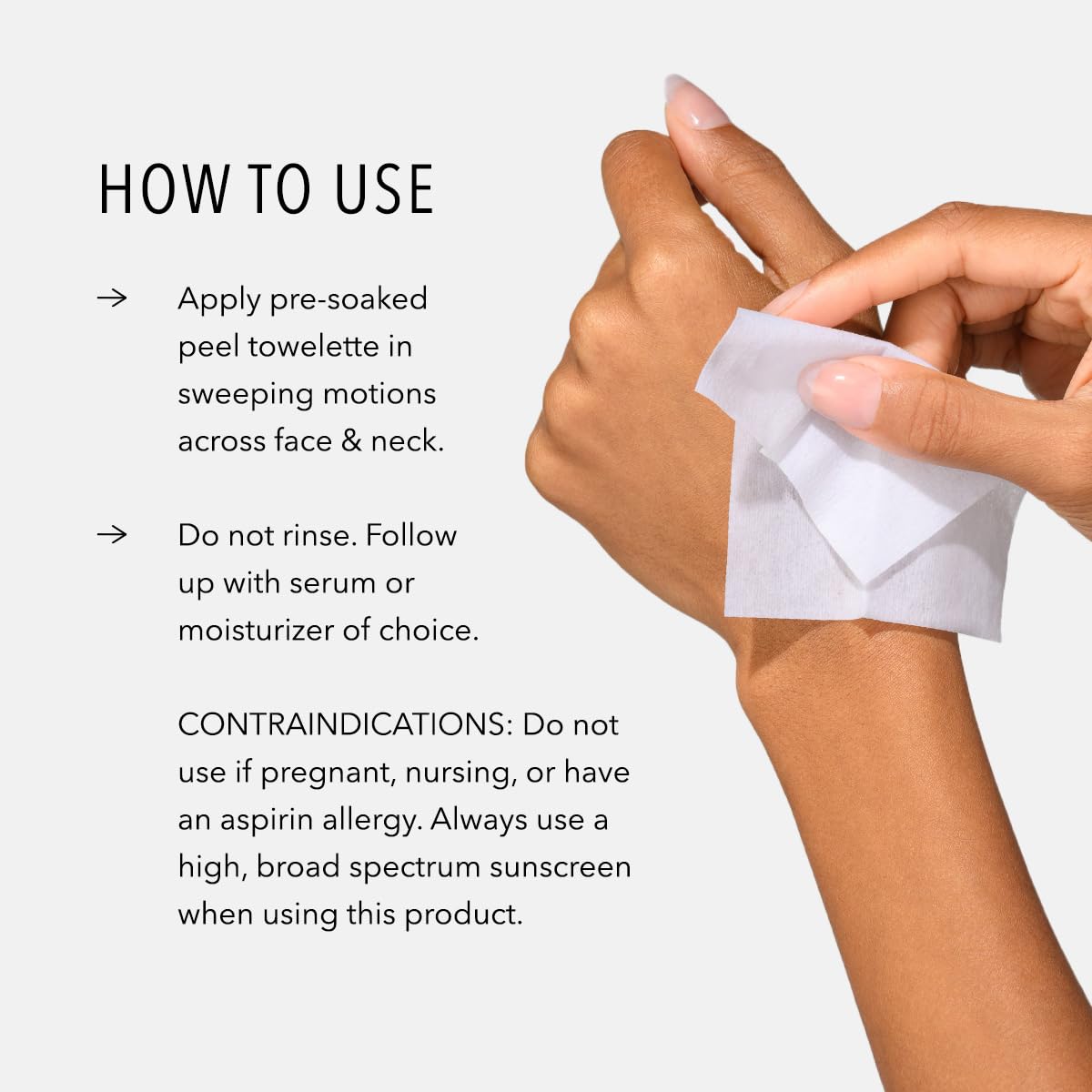 Hand applying HydroPeptide pad to cheek demonstrating easy application