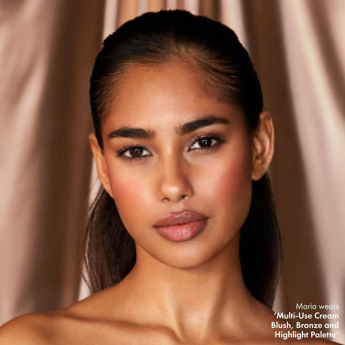 ICONIC LONDON application with fingers blending cream for seamless natural look