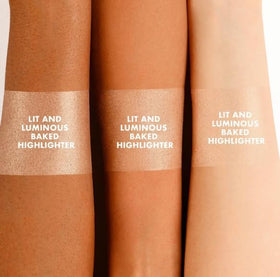 ICONIC LONDON applying highlighter with brush on cheekbone for seamless radiance