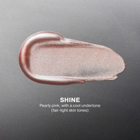 ICONIC LONDON dropper dispensing a single drop for controlled, buildable glow