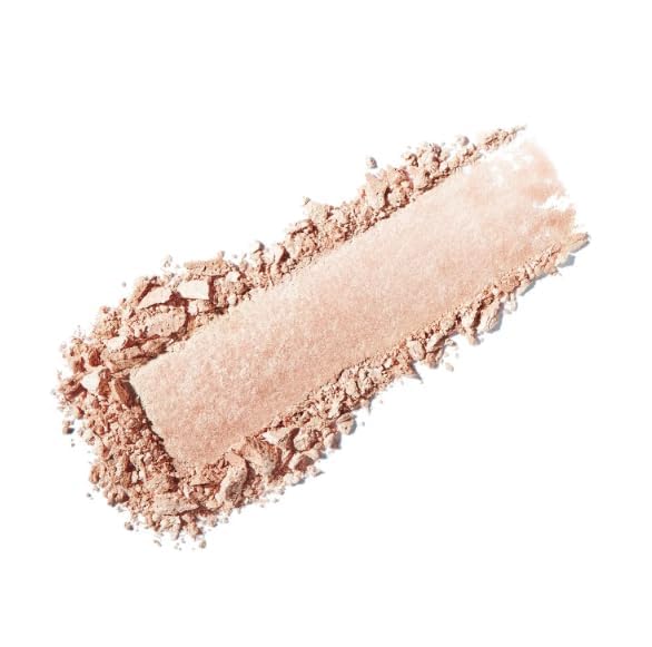 ICONIC LONDON highlighter on makeup table beside mirror for everyday use