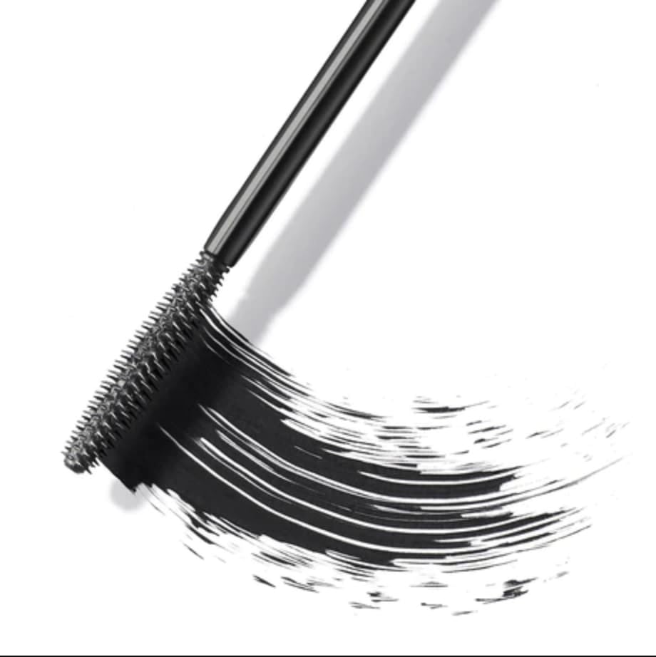 ICONIC LONDON mascara flatlay with makeup items showing travel-ready, vegan benefit