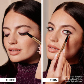 ICONIC LONDON eyeliner held in hand for size comparison showing travel-ready convenience