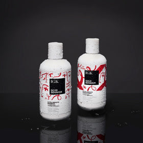 IGK conditioner cream texture on hand showing rich oils and shea butter for detangling