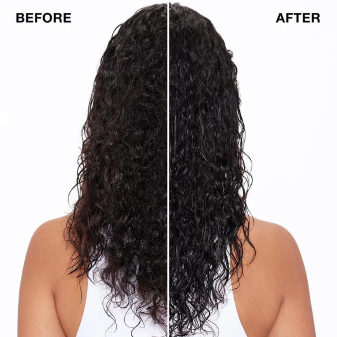 IGK Good Behavior being applied to damp hair delivering slip and detangling