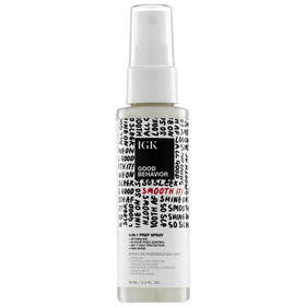 IGK travel bottle front view showing compact prep spray and convenience