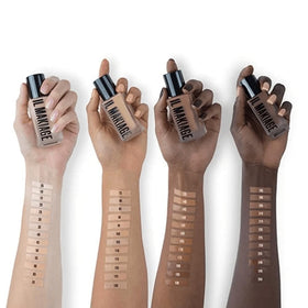 Il Makiage foundation texture near pump highlighting creamy velvet-matte finish and blendability