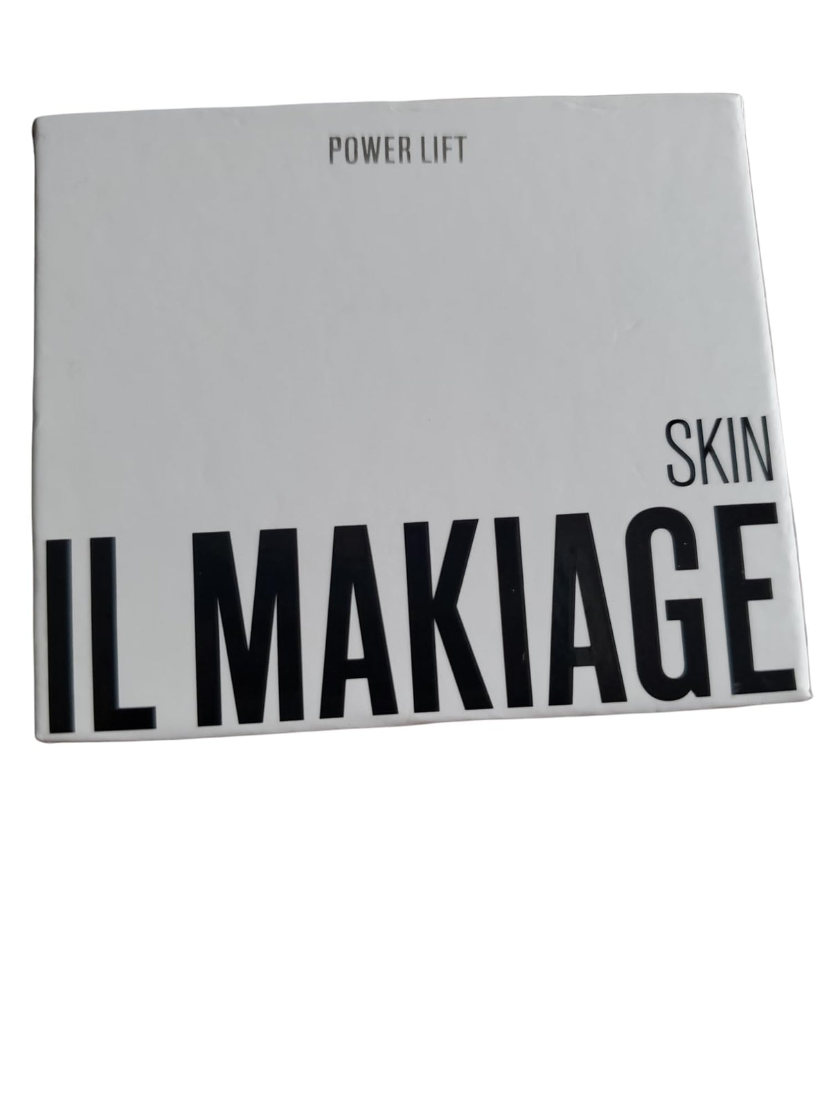 Il Makiage cream being applied to hand, demonstrating priming benefit