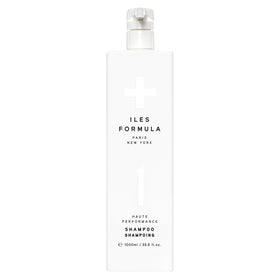 ILES FORMULA front bottle display showing clean salon packaging and premium benefit