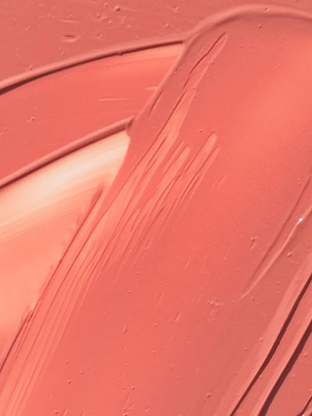 ILIA hand-poured label close-up showing craftsmanship and formula integrity benefit