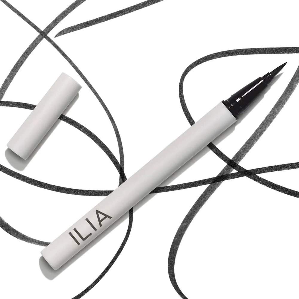 ILIA product in hand for scale showing compact travel-friendly benefit
