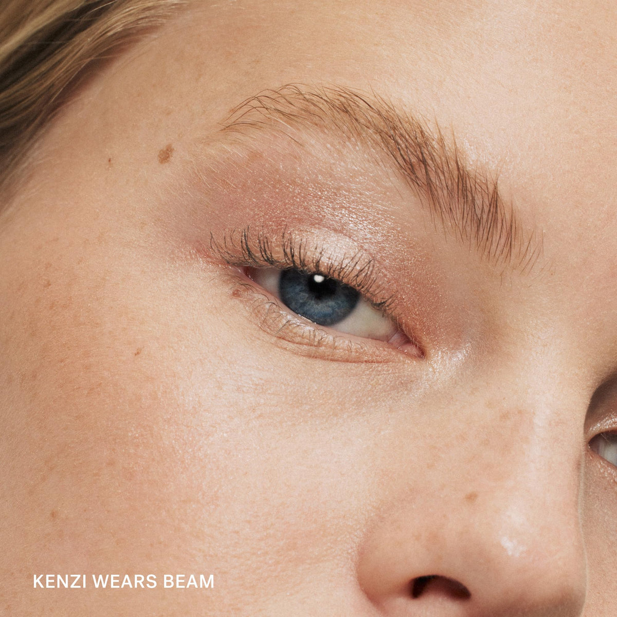 ILIA texture swipe of Beam on skin showing creamy shimmer and blendability