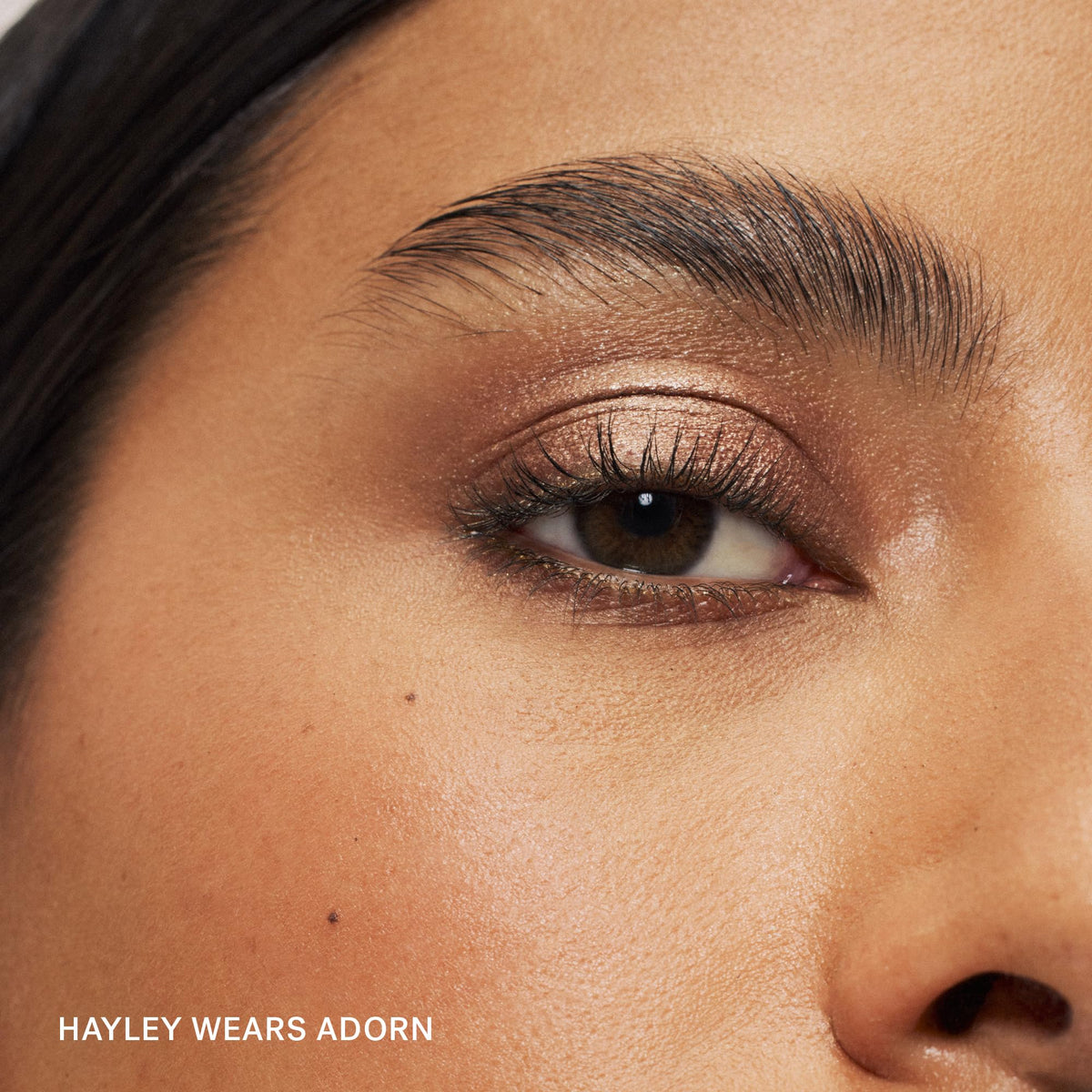 ILIA texture swatch of Adorn on skin displays creamy, blendable shimmer finish