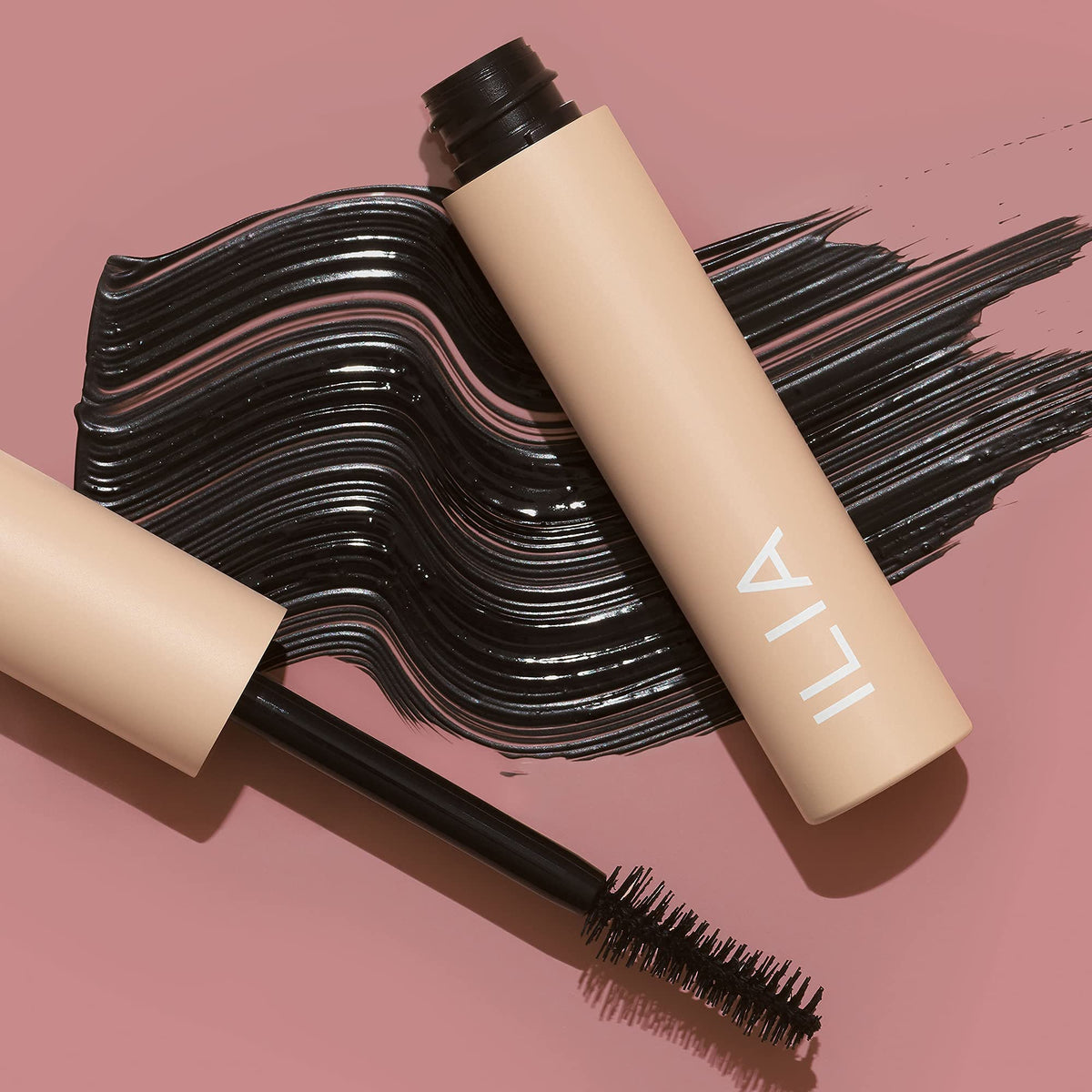 ILIA brush coating closeup showing even product pick-up and separation