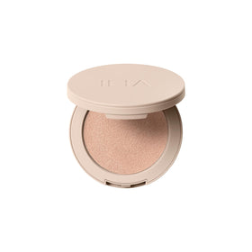 ILIA Lightshift jar front view showing sleek packaging and soft champagne glow