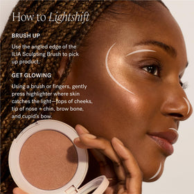 ILIA Lightshift inside a makeup bag ready for on-the-go natural radiance