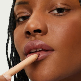 ILIA lip sketch ingredient label close-up highlighting clean, skin-friendly actives