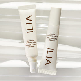 ILIA texture on fingertip showing smooth hydrating formula benefit