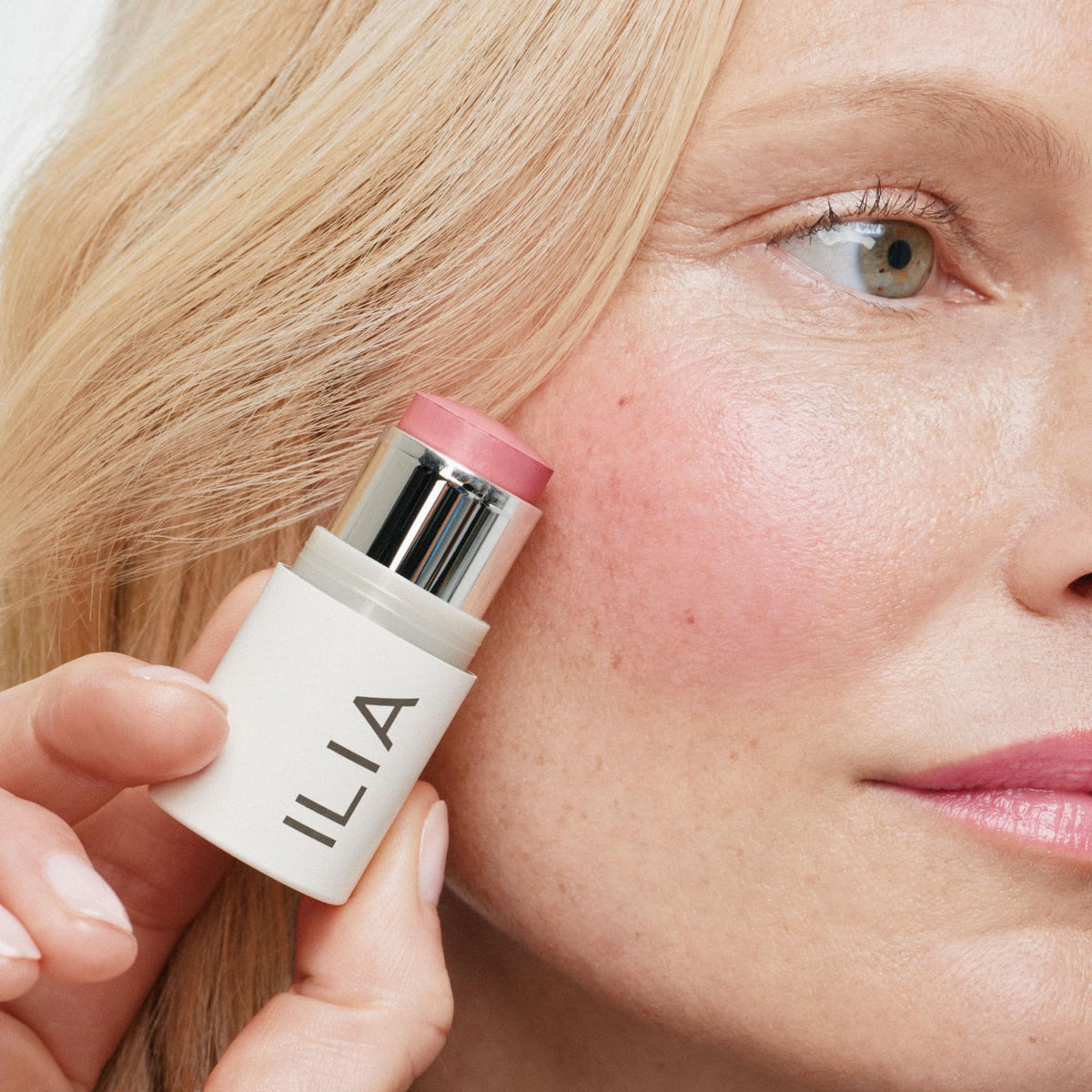 ILIA product on lips illustrating soft pink tint and hydrating comfort