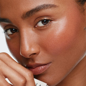 ILIA swipe of color on forearm showing blendable cream and buildable coverage