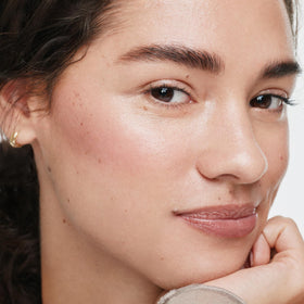 ILIA on cheek application demonstrating blendable natural glow benefit
