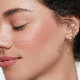 ILIA multi-stick twist-up mechanism detail demonstrating easy, mess-free application on the go