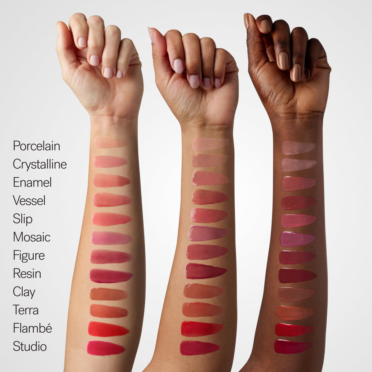ILIA Clay swatch on arm demonstrating warm brown sheer coverage