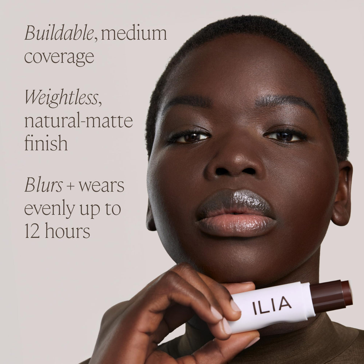 Close-up of ILIA stick label and ingredient callouts — highlights clean formulation benefit
