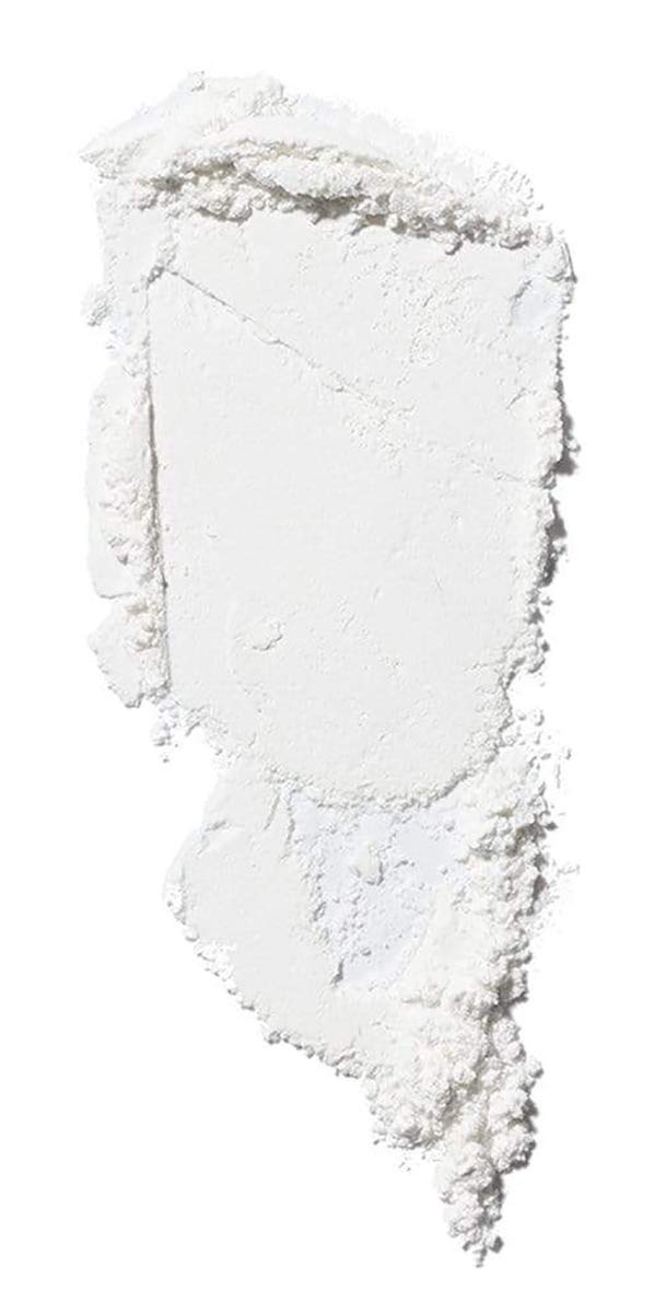 ILIA close-up loose powder texture highlighting ultra-fine milling