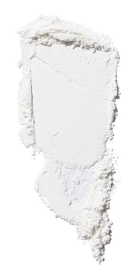 ILIA close-up loose powder texture highlighting ultra-fine milling