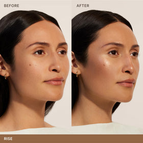 ILIA angled sculpting brush picking up Sunshift bronzer for precise application benefit