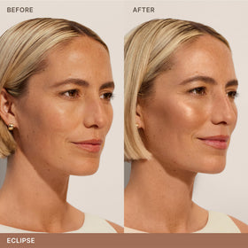 ILIA model applying bronzer to cheekbone for lifted dimension benefit