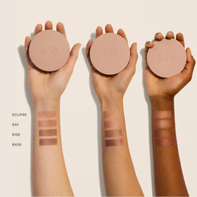 ILIA compact open with pan visible showing convenient refill-friendly design benefit