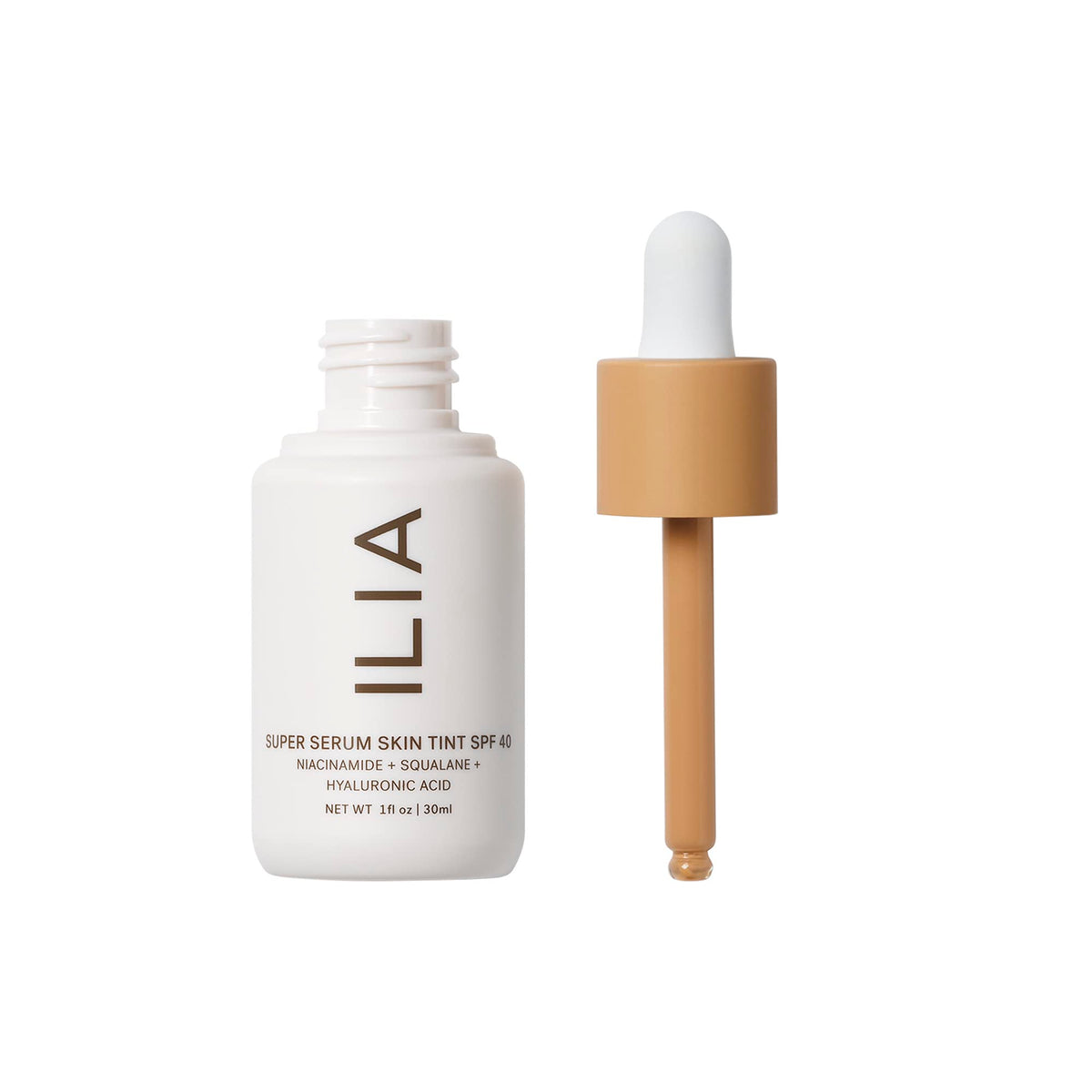 ILIA pump dispensing drop of serum tint, shows lightweight texture benefit