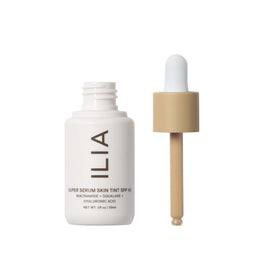 ILIA texture close-up swirl highlighting lightweight serum consistency and dewy finish