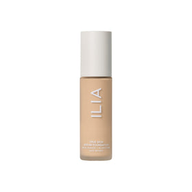 ILIA bottle beside coin for size scale and travel-friendly 30ml