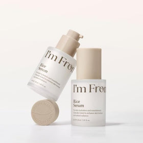 I'm From bottle held in hand to show true 1.01 fl. oz. size