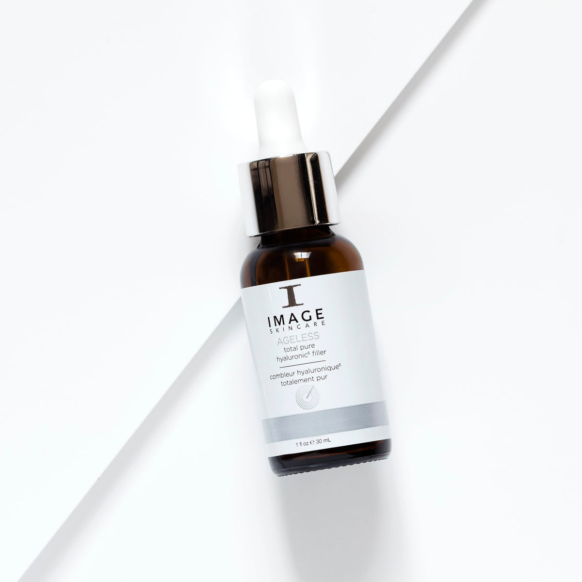IMAGE Skincare dropper dispensing serum demonstrating precise application benefit
