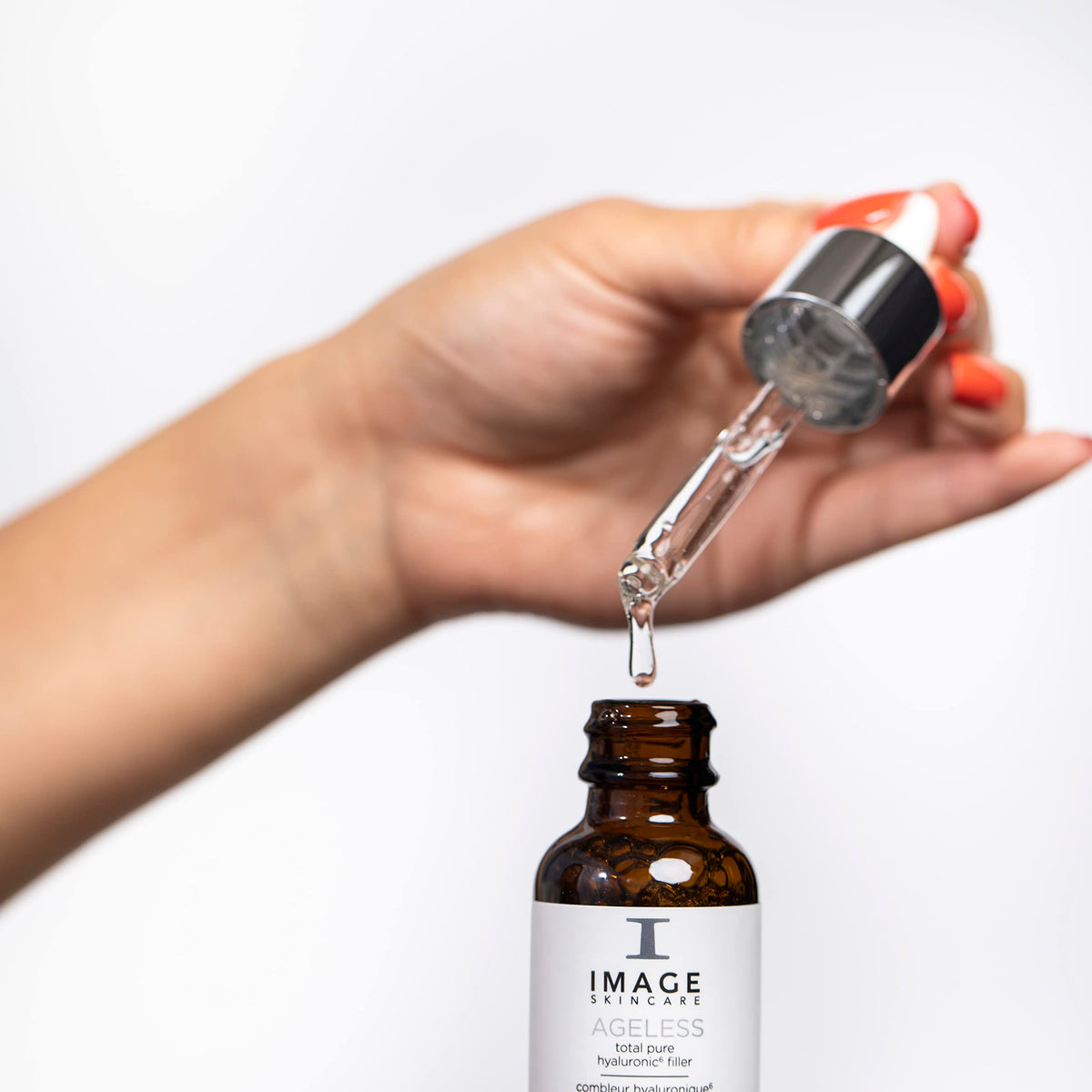 IMAGE Skincare silky serum texture on skin highlighting fast absorption benefit