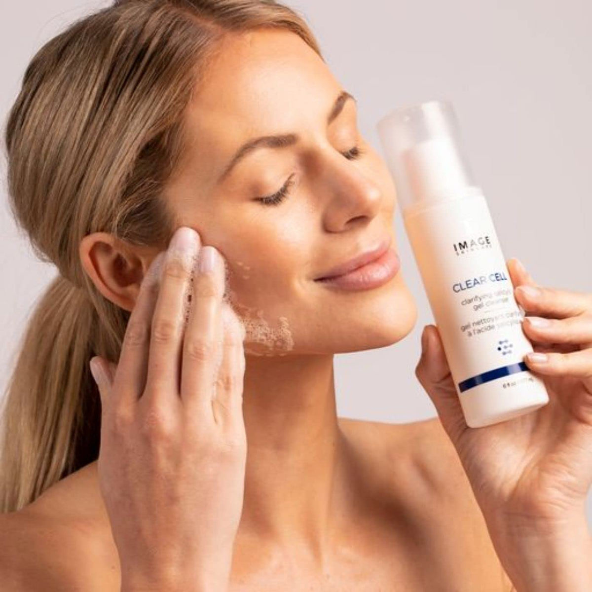 IMAGE Skincare CLEAR CELL ingredients flatlay with honey and botanicals showing soothing support