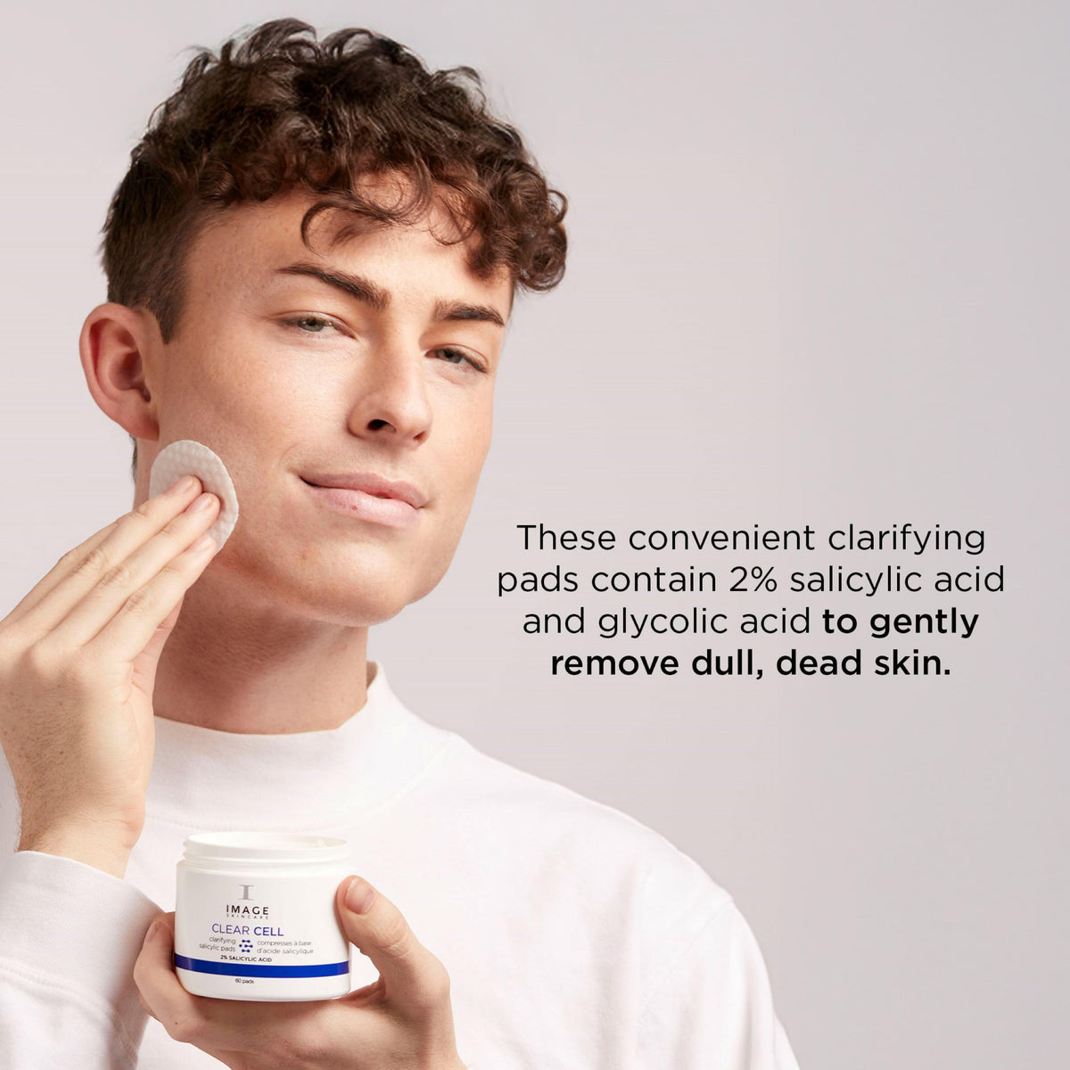 Using IMAGE Skincare pad on cheek to unclog pores and remove oil