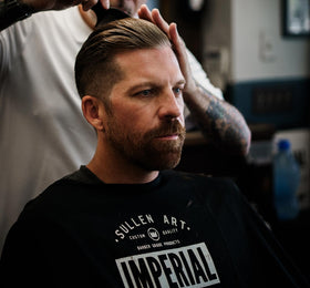 Imperial Barber Grade Products being warmed in hands, demonstrating easy application and spreadability