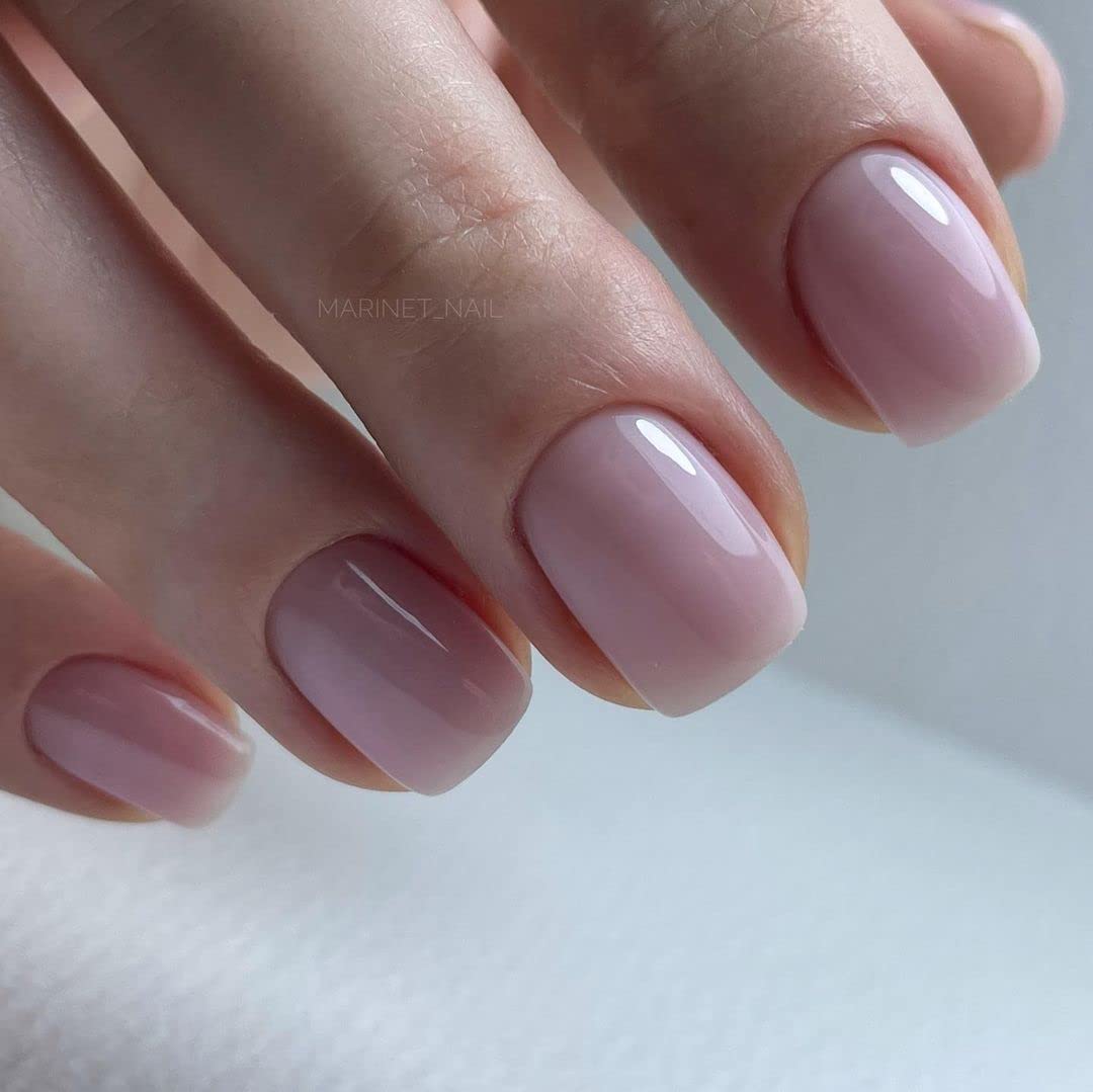 IN.HYPE manicured hands in natural light showing finished nails with smooth base and improved appearance