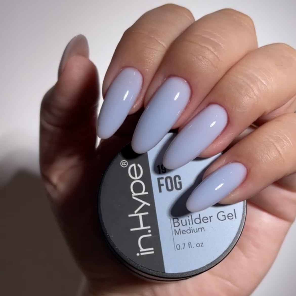 IN.HYPE gel application on nail form demonstrating controlled extension building