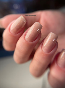 IN.HYPE cured nails shimmer finish highlighting natural nude coverage