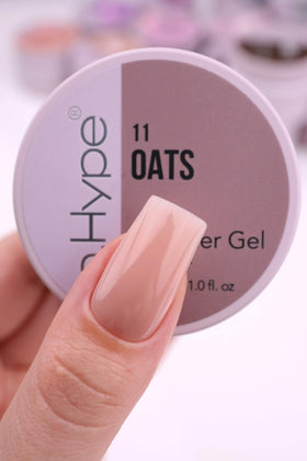 IN.HYPE overlay on natural nail closeup showing strengthened, smooth nail surface