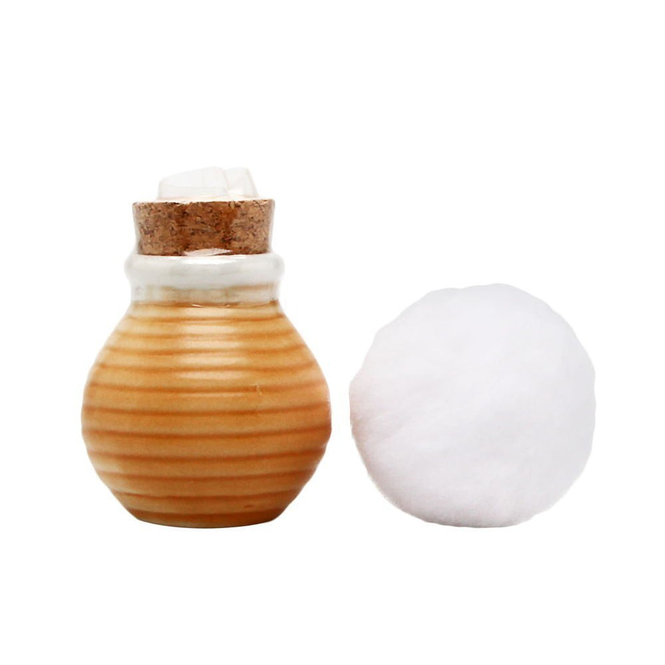 Indian Earth bronzer jar front view showing decorative lid and portable 2 g size for easy touch-ups