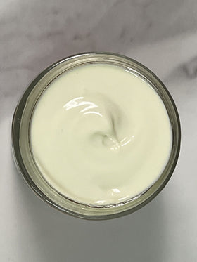 Indian Meadow Herbals cream swiped on hand demonstrating quick absorption and hydration
