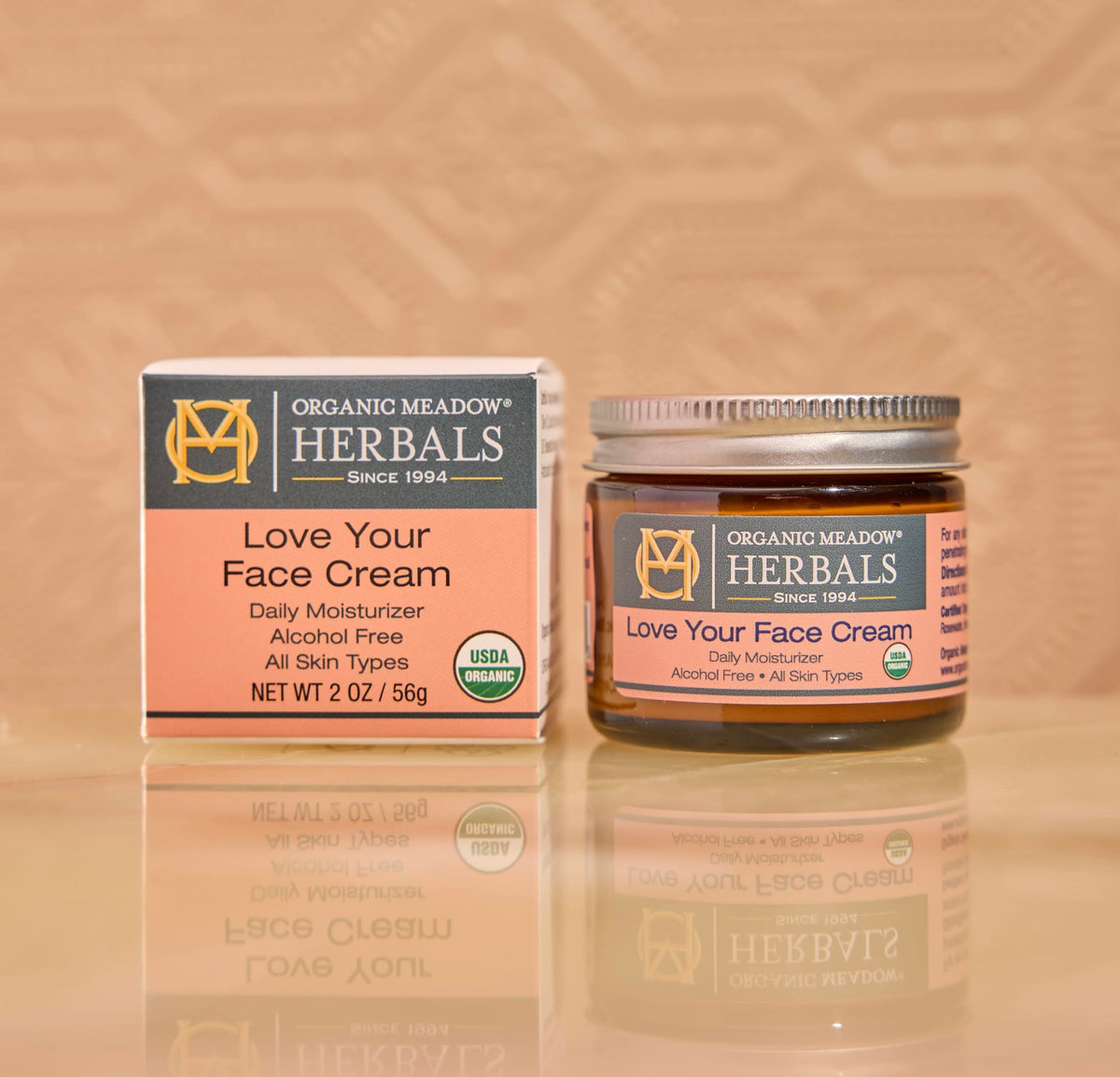 Indian Meadow Herbals hand applying cream demonstrating smooth spread and hydration